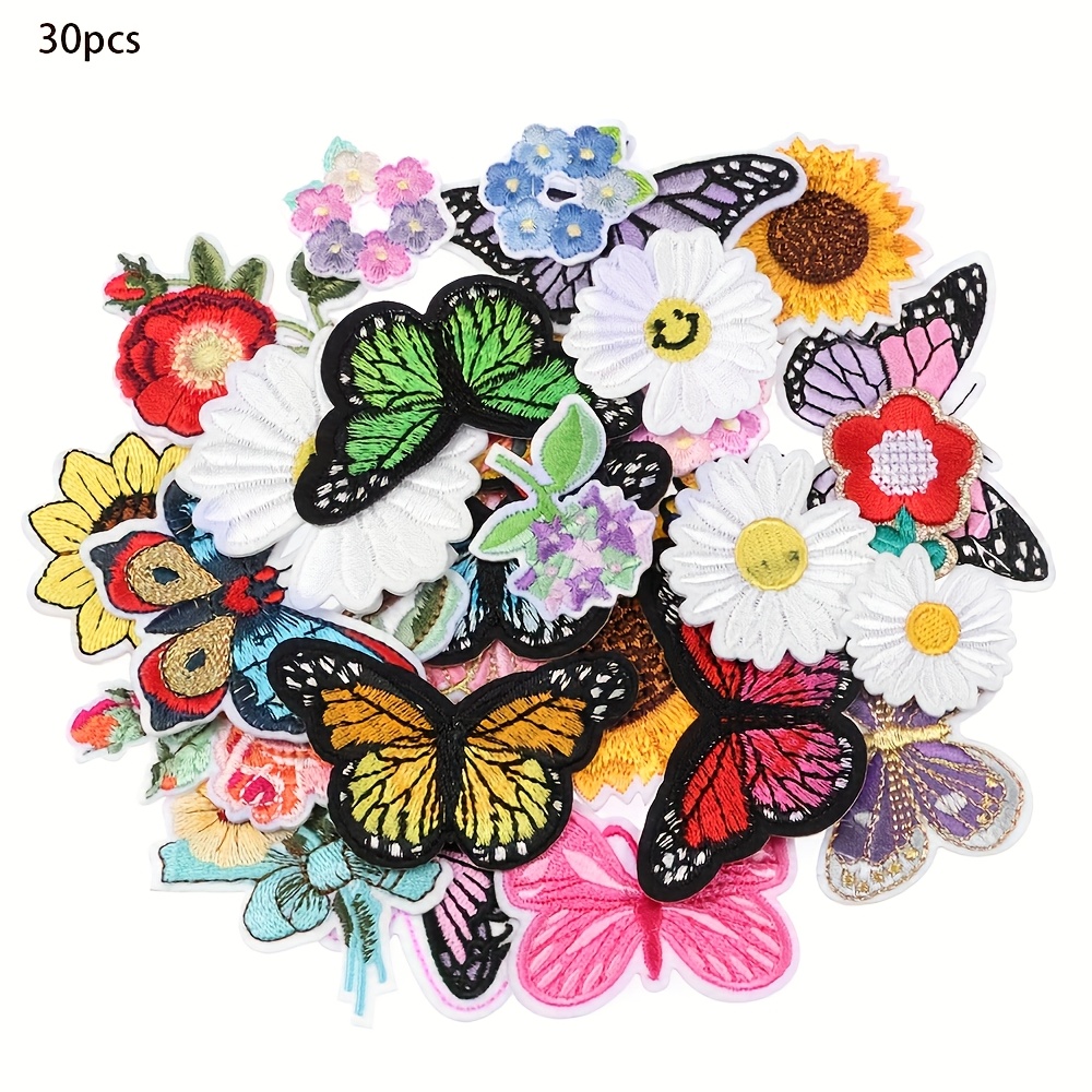 Image of 30pcs Per Bag Of Assorted Designs Featuring Large Spotted Butterflies, Sunflowers, Roses, And Chrysanthemums As Fabric Patches