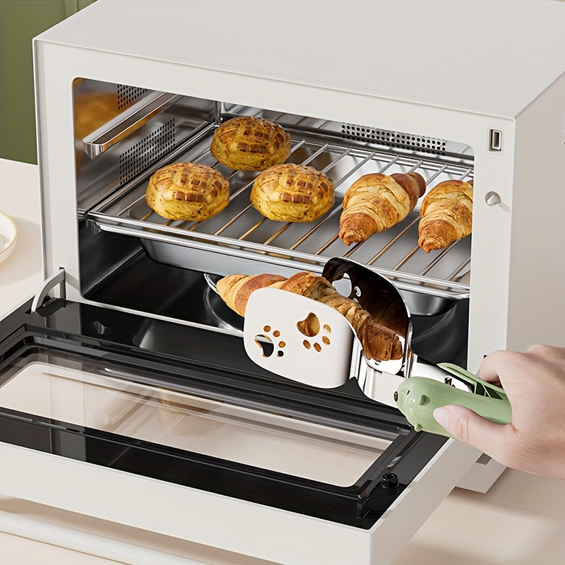 stainless   spatula for home use portable kitchen tool that   used as   a clamp and a spatula multifunctional kitchen utensil Product details 3