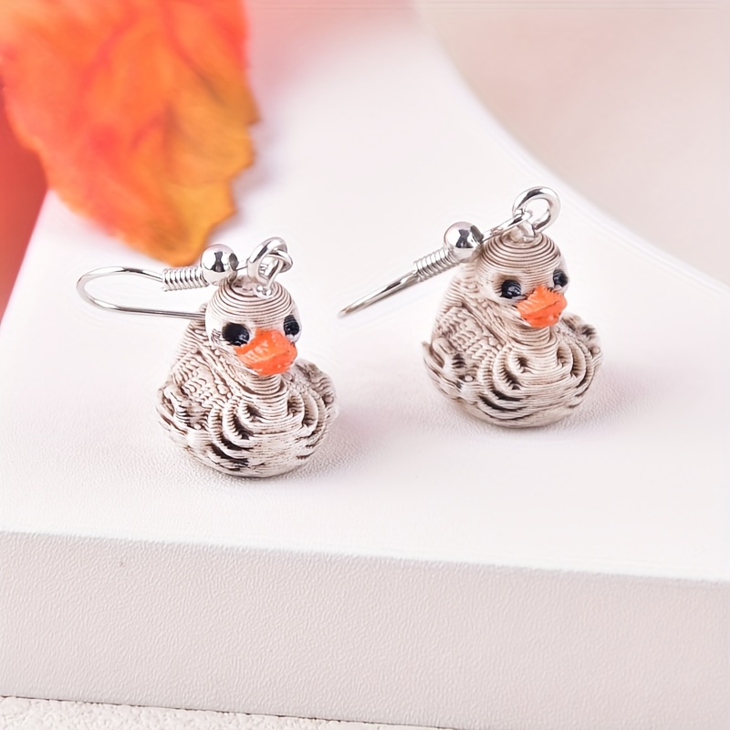 TEMU Un par de aretes colgantes de moda para mujer de resina con esqueleto de Halloween