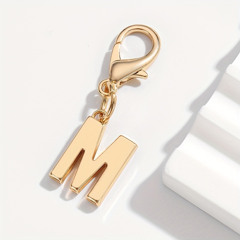 A Stylish And Minimalist Mini Keychain Featuring The Of Alphabet, Perfect For Decorating Women' Keys, Bags, And As A Gift