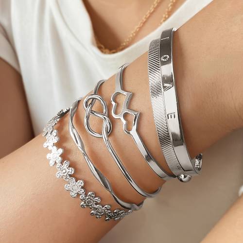 a set of six fashionable cuff bracelets for women featuring vintage double peach heart knot small flower geometric element bangles suitable for daily wear vacation or as a gift