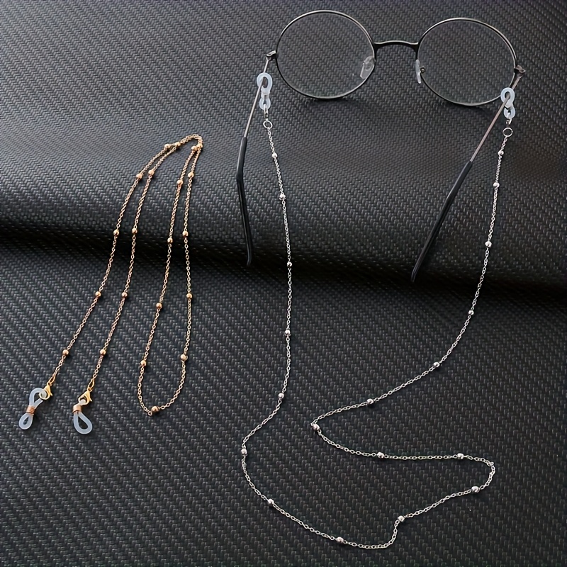 

Chaîne de Lunettes en Métal Élégante et Simple avec Perles - Antidérapante, Lanière de Lunettes et de Lunettes de Lecture pour Femmes - Dorée ou Argentée, Convient pour ou le Port Décontracté