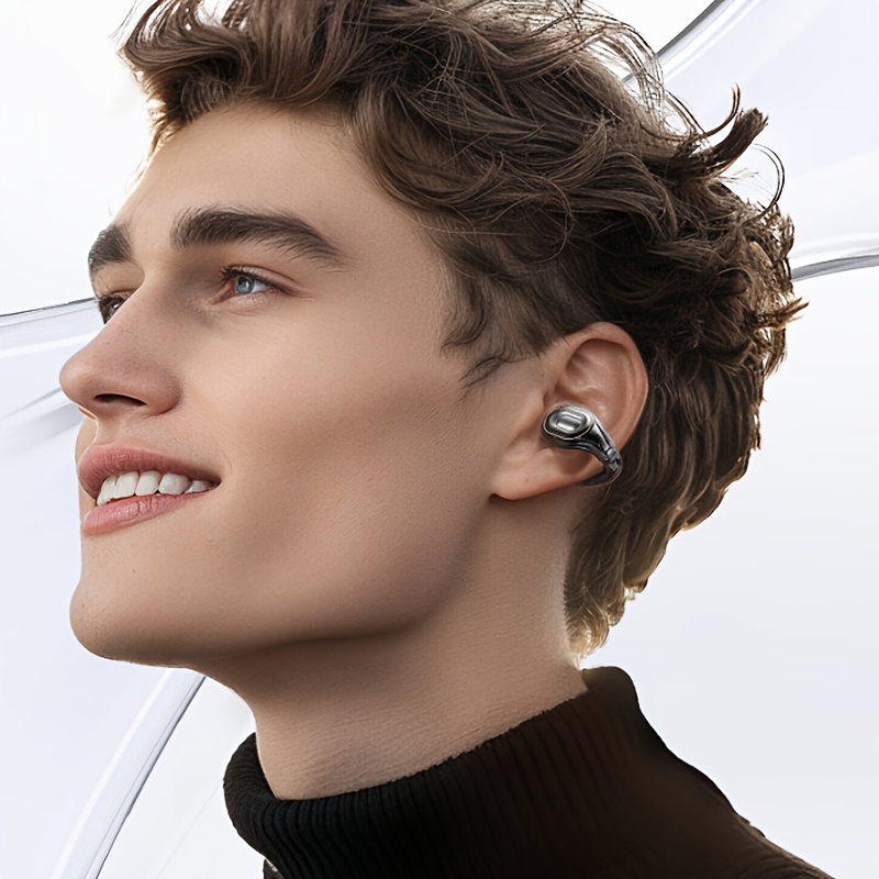 De draadloze oorclip hoofdtelefoon