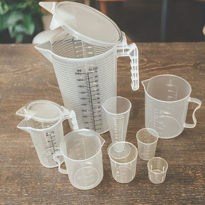 Image of Set Of 8 Measuring Cups (from 2000ml To 30ml) Made Of Plastic, Suitable For Baking, Cooking, And Mixing (includes Sizes 2000ml, 500ml, 250ml, 100ml, 50ml, And 30ml)
