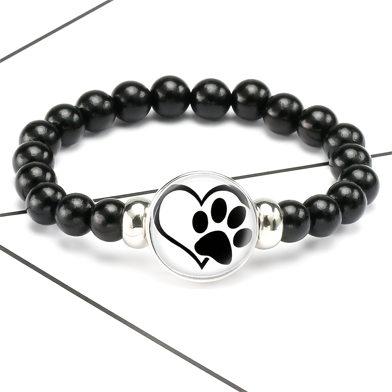 E-shop Eine verpackte Ware (Klassisches schwarzes Kunststoffperlen- und Kettchenarmband für Herren), mit einem einzigartigen Design, das ein