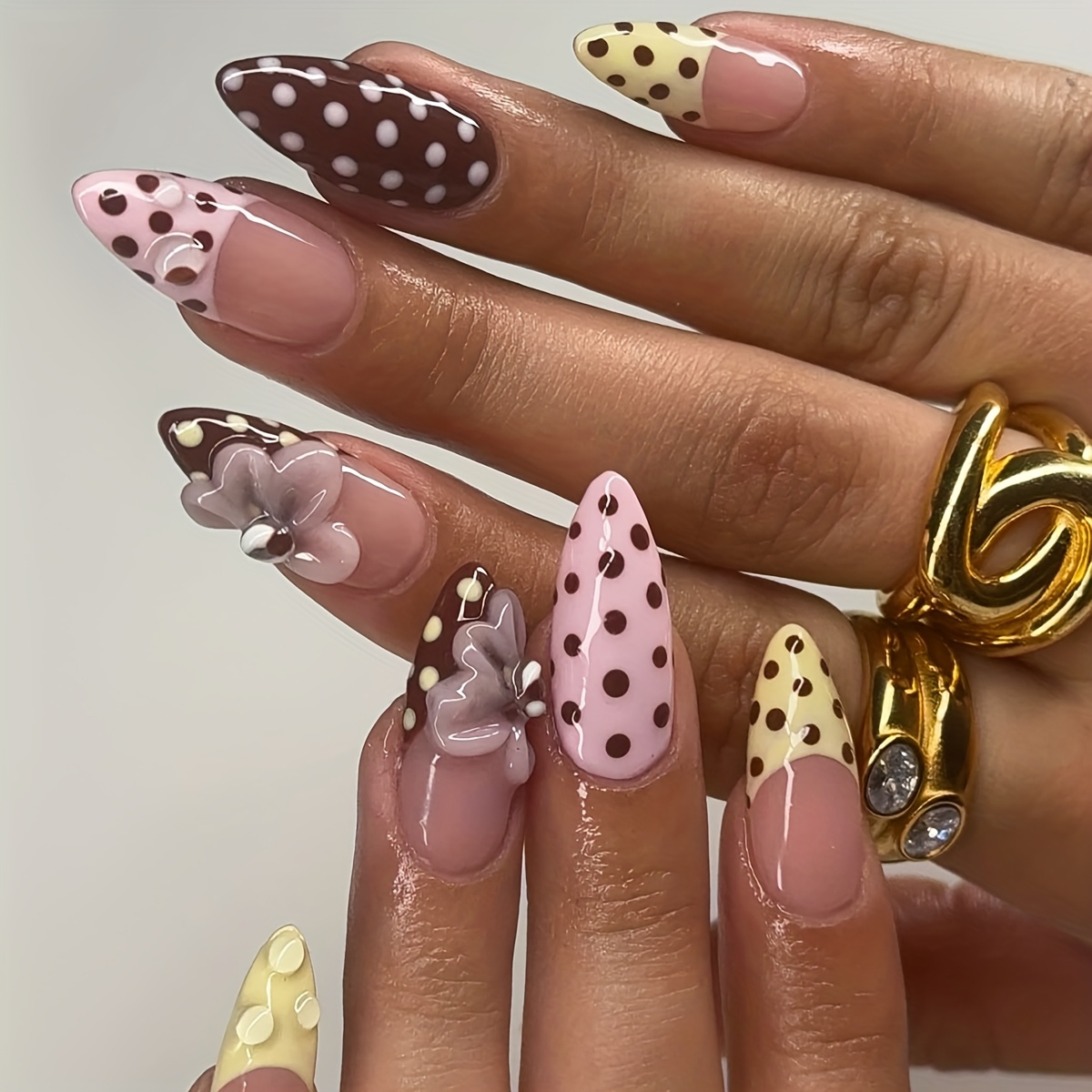 A Set Of 24 Long Almond-shaped Press-on Nails In A Gift Box, Featuring A New Autumn Design With Beige French Tips, Pink-brown Polka Dots, 3d Floral Embellishments, And Colorful