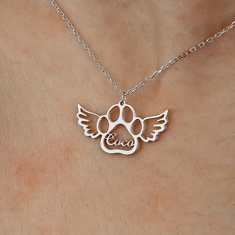 TEMU Wings And Paw Print Custom Necklace For Pet Owners! Wings Surround The Paw Print Shape, Which Engraved With The Pet's Unique Name. 304 Stainless