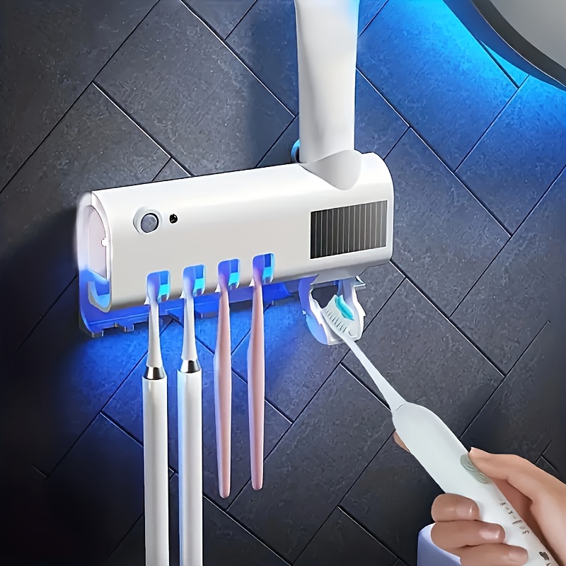 この UV 歯ブラシ消毒剤ホルダー - 滅菌器、壁掛けステッカー、歯磨き粉ディスペンサー、ワイヤレス充電、ソーラー  パネルで口腔衛生に革命を起こしましょう。