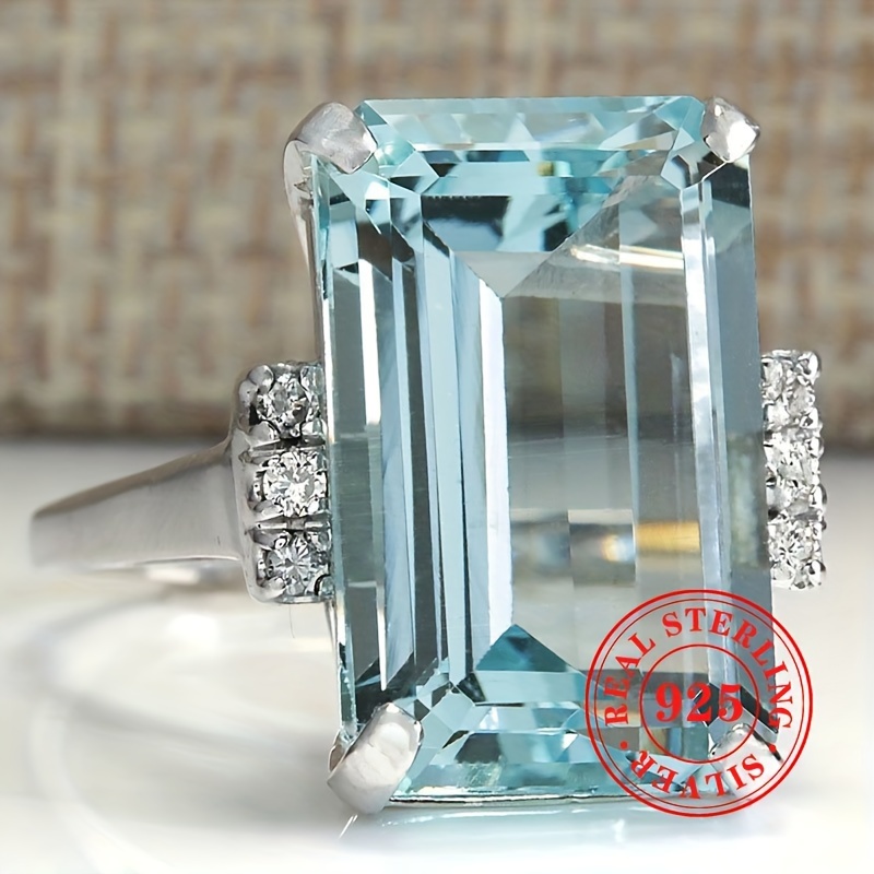 

Elegant Sterling Silver 925 Ring With Synthetic March Birthstone, Aquamarine-colored Gem, Party Banquet Jewelry, 4- Setting, All