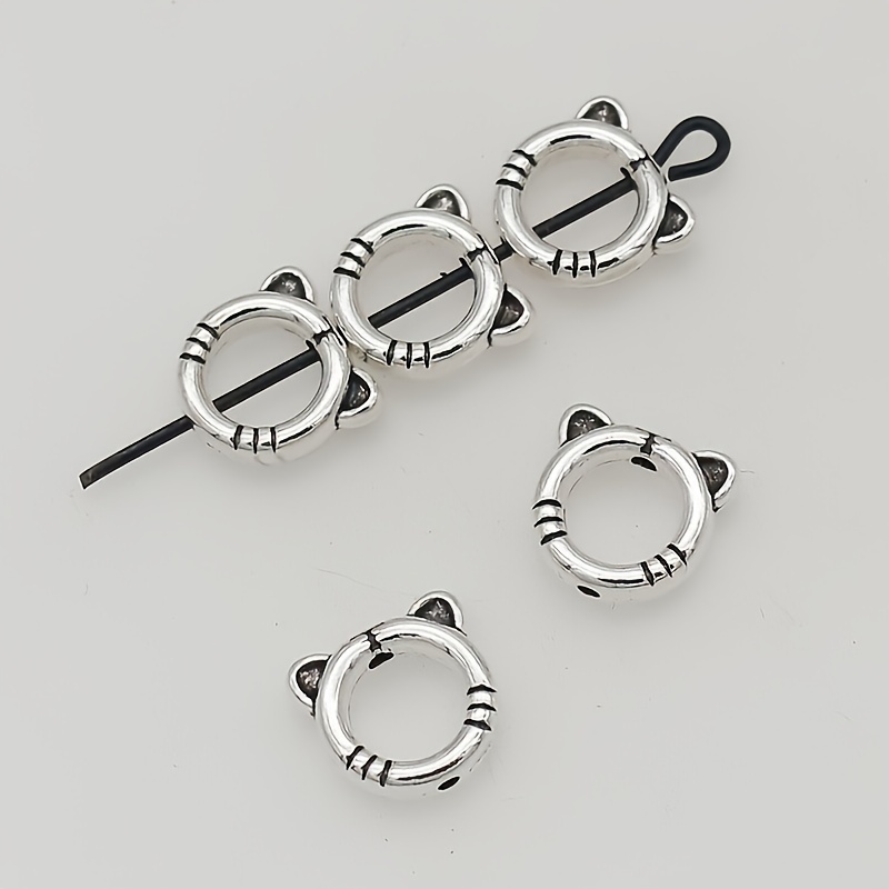 

A Set Of 20 Fashionable And Unique Silvery Cat Head Beaded Bracelets And Earrings, Suitable For Accessories.