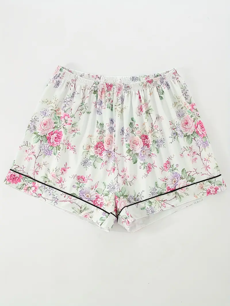 a floral pajama set featuring a short sleeve button up top elastic waist shorts and long pants suitable for year round wear casual womens sleepwear in Product details 2