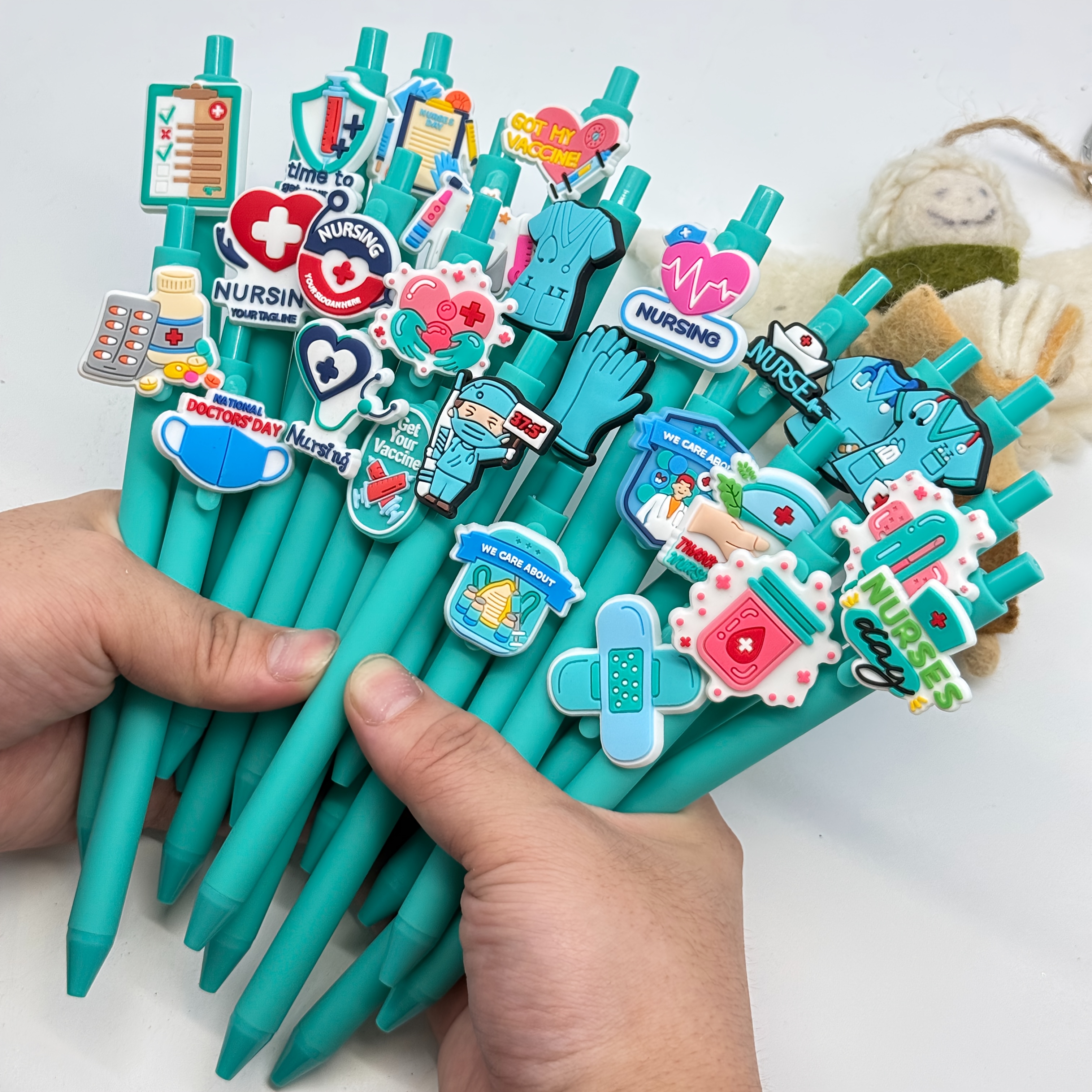 12 25 retractable ballpoint pens from   series in teal color designed for   and nurses featuring   mechanism with black ink refills       documents and a   stationery gift Product details 0