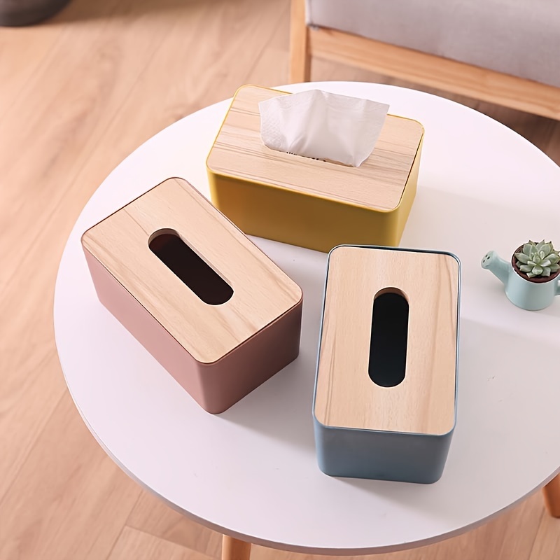 

A Box With A Plastic Base And Bamboo Lid, For Disposable Tissues. An Elegant Storage Dispenser For Home And Office Use, Dining Tables And Coffee Tables.