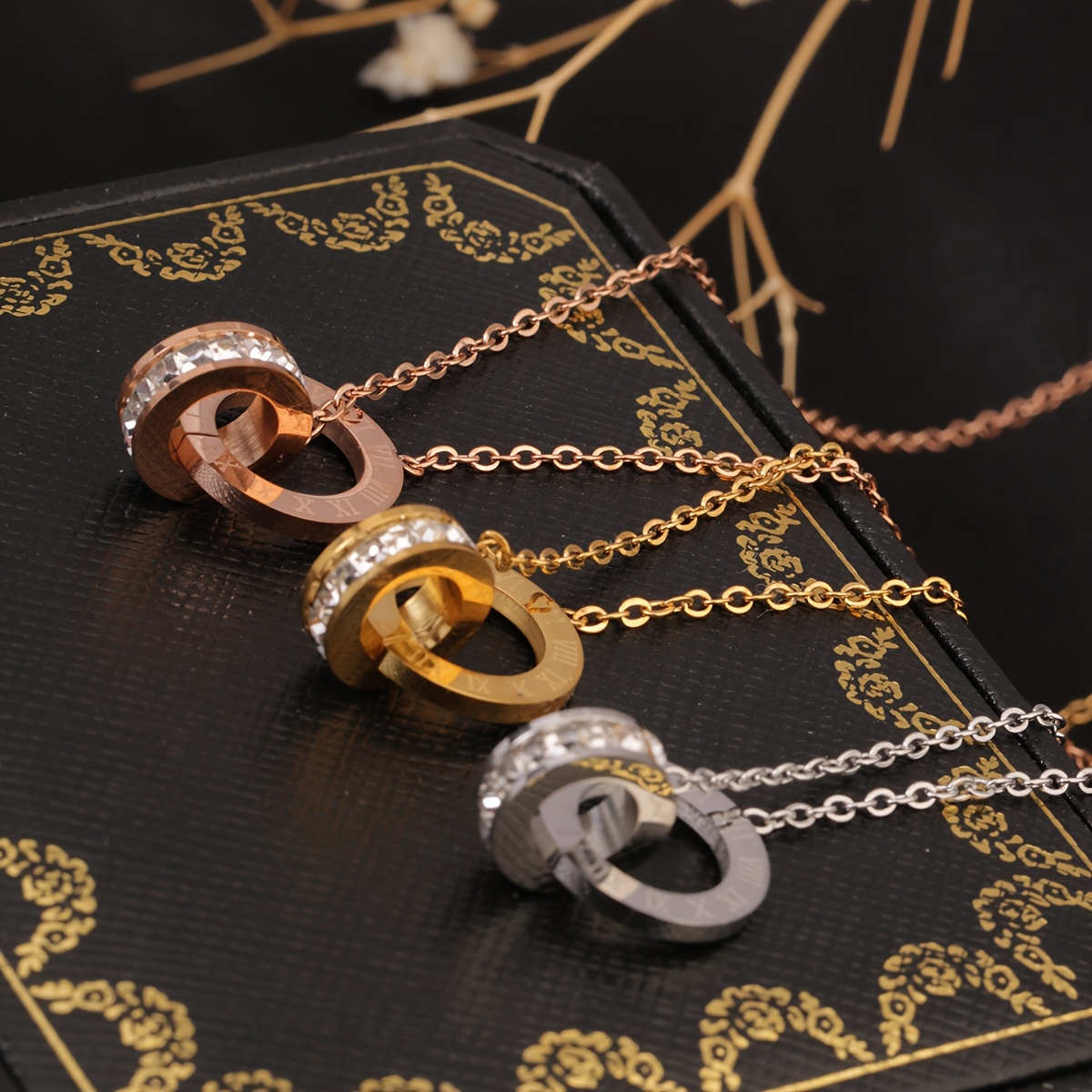 a stainless steel 18k golden plated roman     pendant with rhinestones and artificial crystals featuring a simple and     elegant and suitable for womens daily wear or parties perfect as a birthday gift or for Product details 2