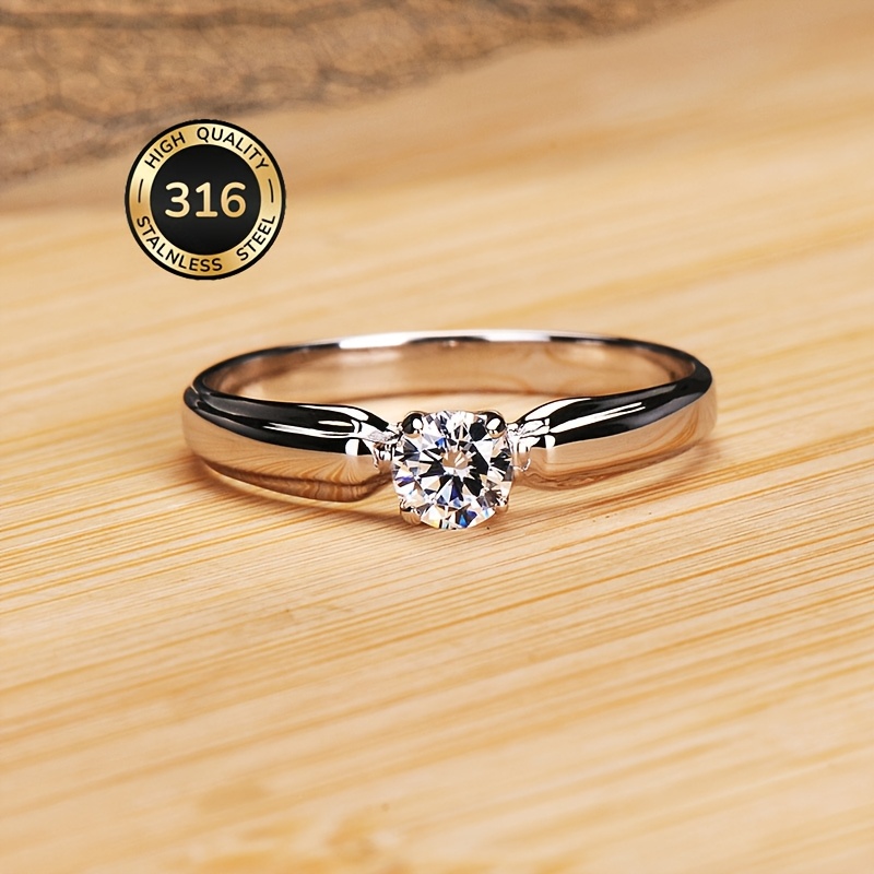 TEMU Bague de fiançailles simple et , 1 pièce, en acier inoxydable 316, entièrement sertie de synthétique ronde à quatre griffes