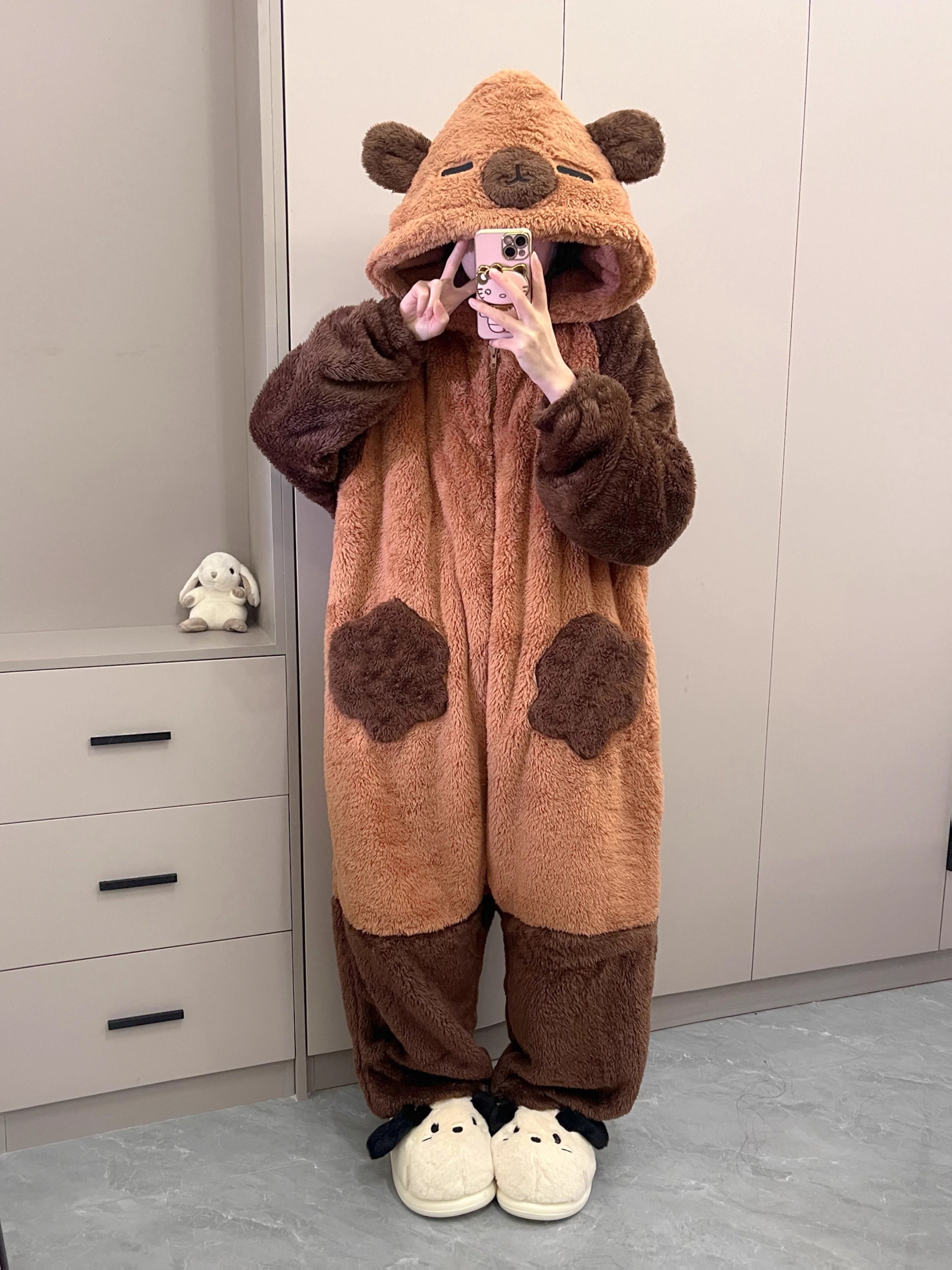 new cartoon style   onesie for women featuring thickened plush material warm long sleeves a hood and suitable for wearing outside as loungewear