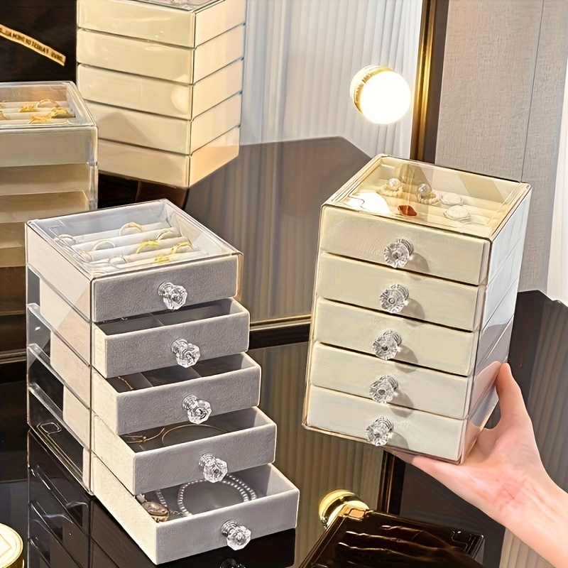 a jewelry storage   and five layered designed for necklaces rings and earrings this exquisite and high end accessory box features multiple transparent layers with large capacity catering to   storage needs     decoration and organization making it an ideal gift for valentines day christmas and birthdays Product details 0