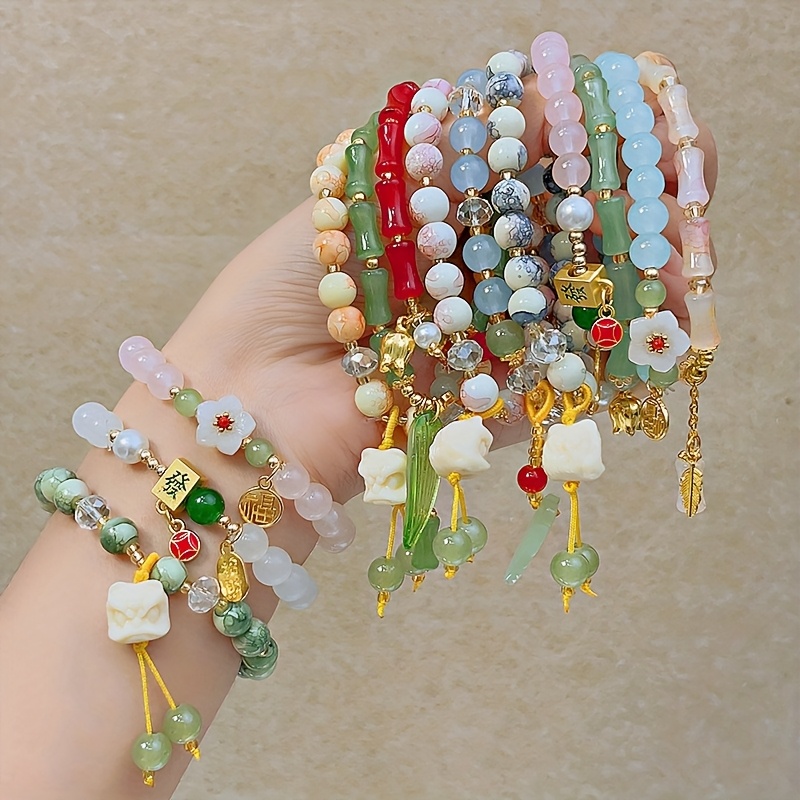 20 piezas de colgantes de   chinos de estilo aleatorio, cuentas de aleación doradas y  , accesorios para pulseras diy, componentes para pulseras chinas adecuados para accesorios de joyería diy