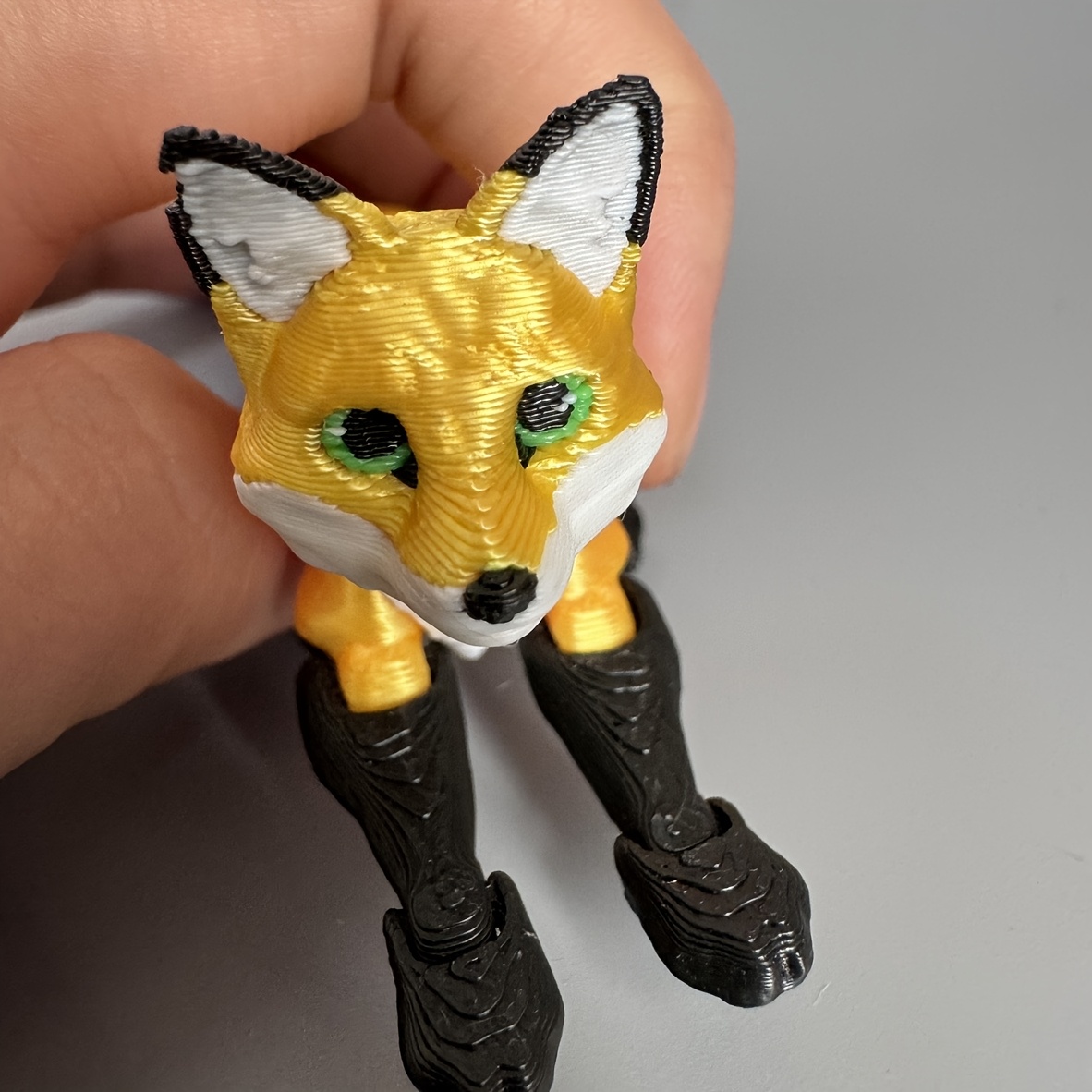 

A 3d Printed Multi-joint Fox Statue - A Collectible, Perfect As A Handheld Gift For Festivals - No Power Required, A Plastic Decoration For Home And Office Desks.