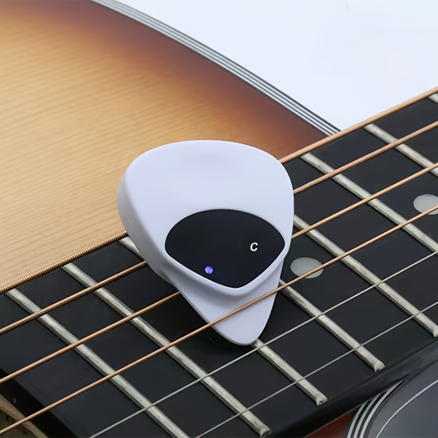 Dual-Purpose Instrument Tuner with Pick Function, Compact and Lightweight Design, Sensitive Sound Detection, 12-Tone Equal Temperament Mode Suitable for All Musical Instruments, Studio Equipment, Musical Instrument Tuning, Portable Tuner, Sleek Tuner, Durable Construction, Accurate Pitch Tool, Dualpurpose Tuner, Sound Detection Tuner, Piano Tuners, Musicians