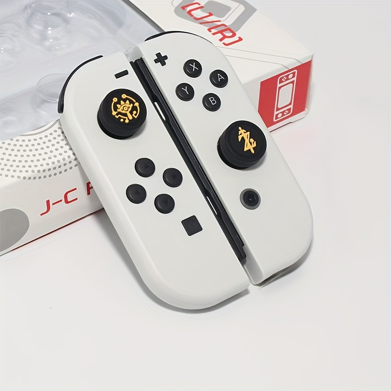 item picture 4pcs   eye themed joystick caps designed for   switch and switch oled lite joycon controllers made of silicone to enhance grip   suitable for extended gaming   and   alternately replaced