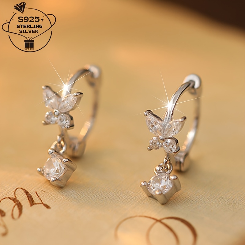 

A Pair Of 925 Silver Earrings Featuring Synthetic Zirconia In A . Suitable For Pairing With All Outfits. A Perfect Luxurious Gift For Valentine's Day And Other .