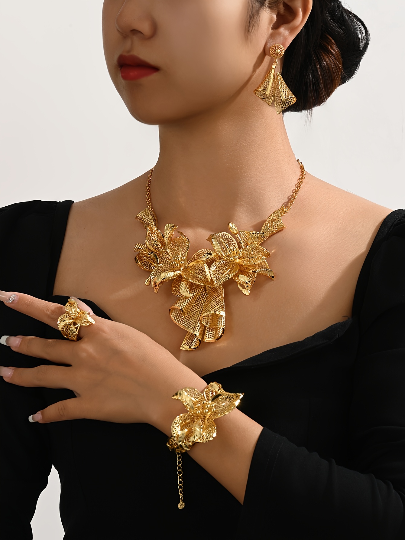 an   18k gold plated jewelry set featuring an elegant floral necklace an adjustable ring and pendant earrings   everyday wear and festive celebrations details 0