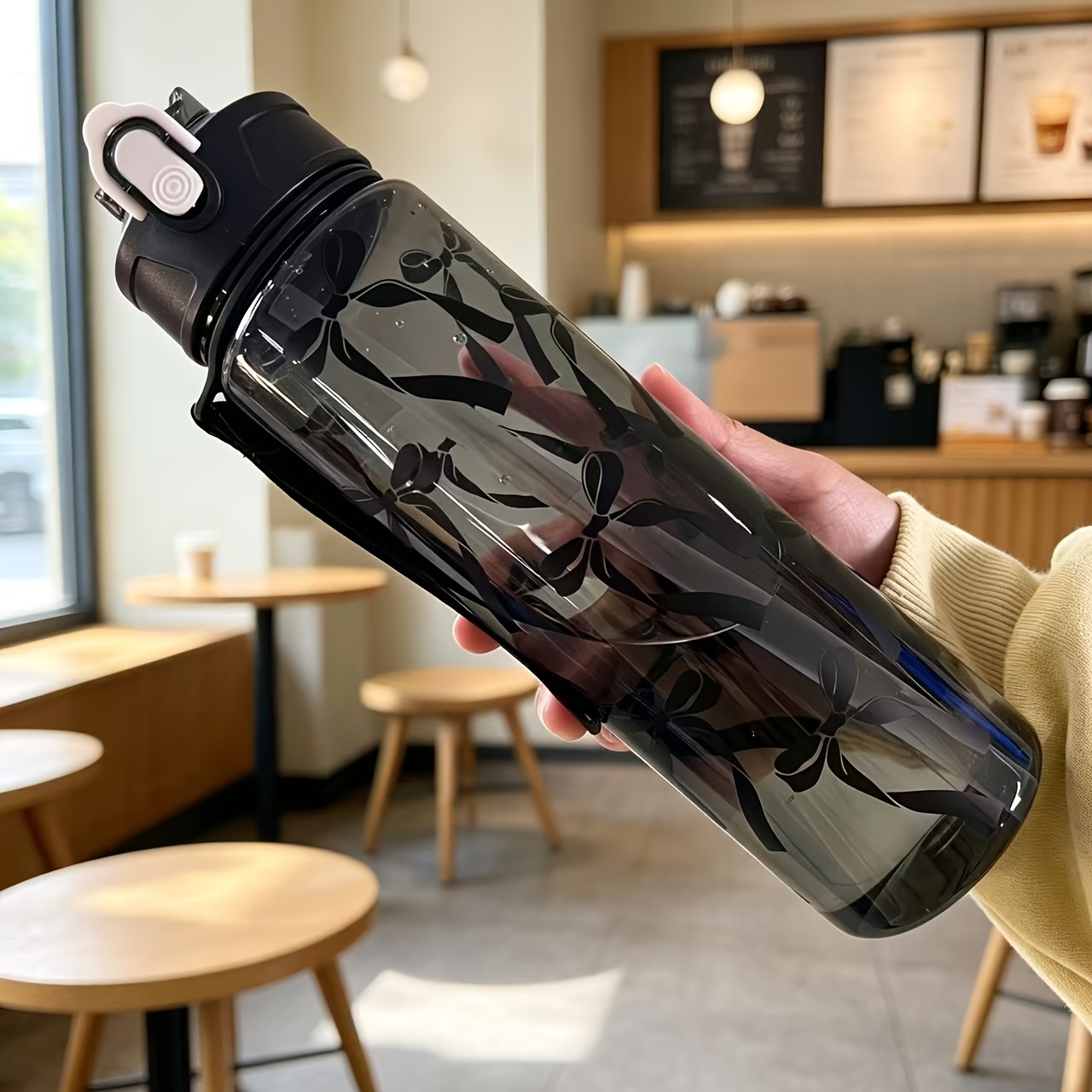 Image of 750ml Floral Bow Large Capacity Water Bottle High Aesthetic Straw Cup With Handle Portable Suitable For Travel And Gatherings One-button Pop-up Lid