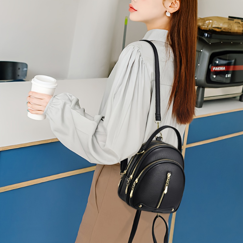Bolso de viaje para mujer, elegante y minimalista, compacto con múltiples compartimentos, multifuncional como bolso de hombro, bandolera, mochila y tote, con un cierre de cremallera con orientación aleatoria.