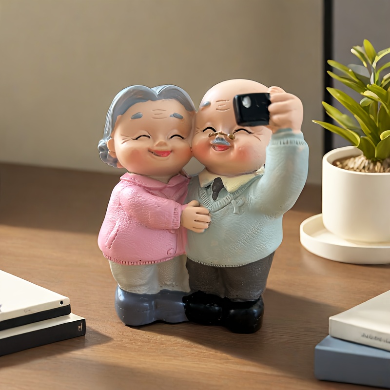 

Elderly Couple Figurines - Resin Statue Of Grandparents Embracing With Smartphone, Birthday & Holiday Gifts, Ideal For Home Decor, Statues For Home Decor