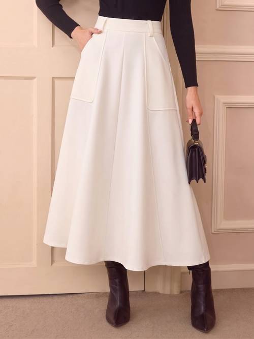 a versatile elegant solid color skirt with sense belt not included