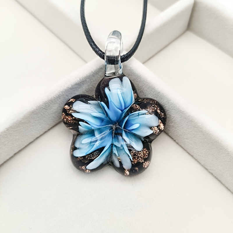 Glass Pendant Necklace on Floral Background for Daily Occasion