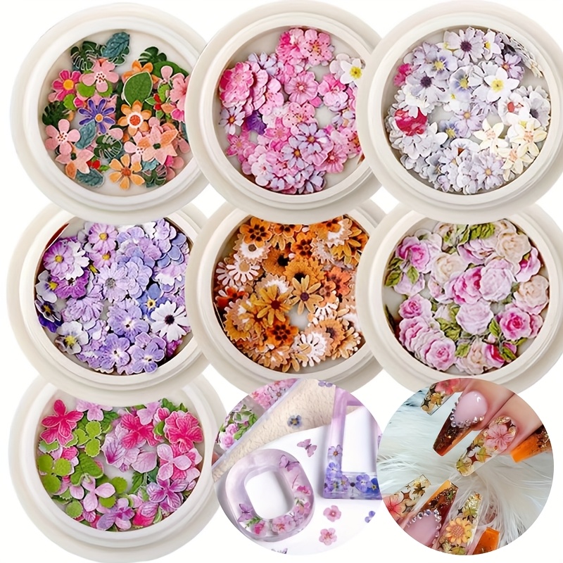 350 piezas en 7 cajas que contienen flores hechas de resina epoxi, con una   de flores de   de madera   como rosas,   y  , ideales para hacer joyas, proyectos  , decoraciones de uñas para   de san valentín