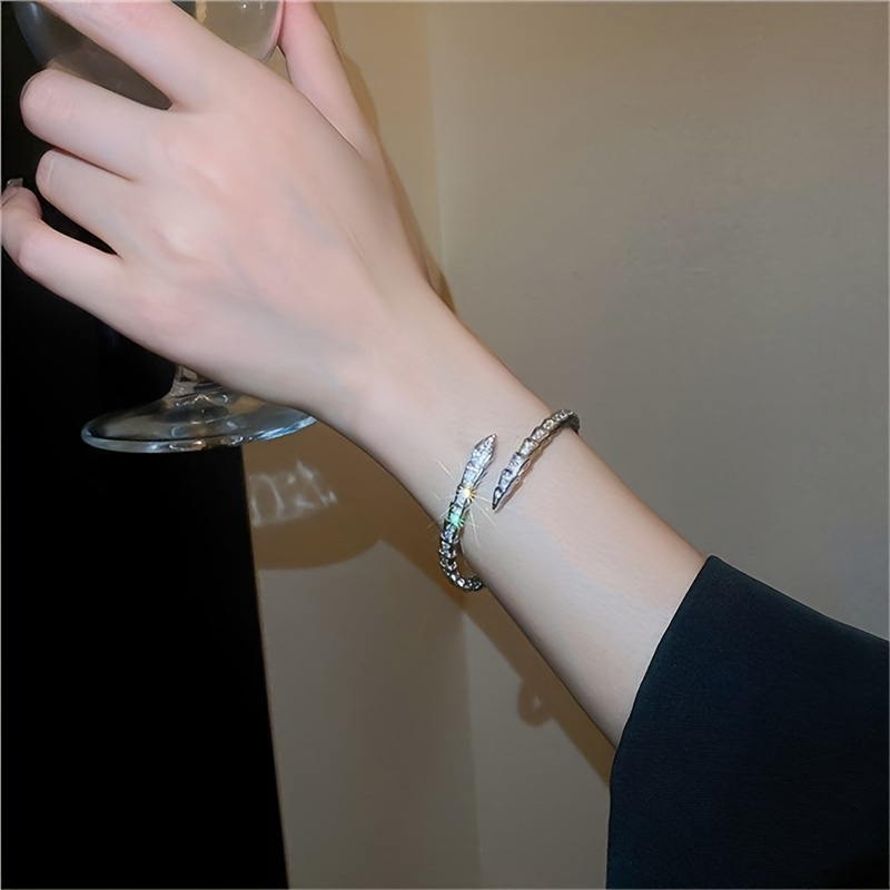 Chic Snake-Shaped Open Cuff Bracelet with Sparkling Cubic Zirconia - Minimalist Women's Fashion Accessory for Casual Attire details 6