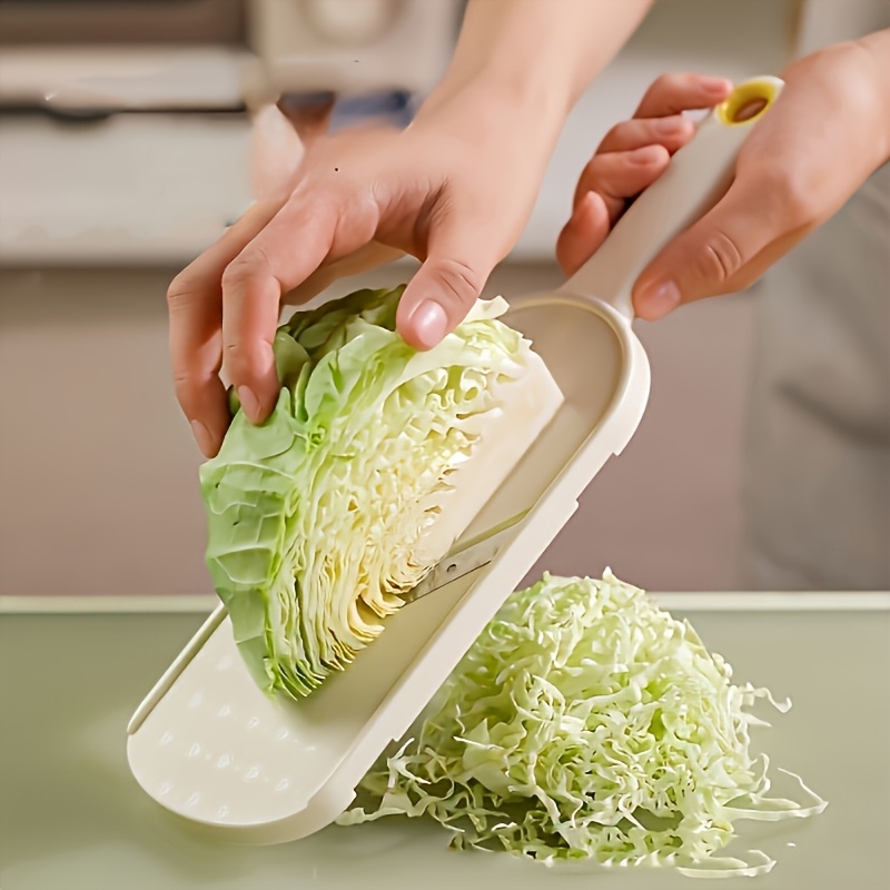   and slicer durable stainless steel kitchen tool for salad preparation ergonomic handle   vegetable grating and cutting ideal for cabbage cucumber carrots   storage container    