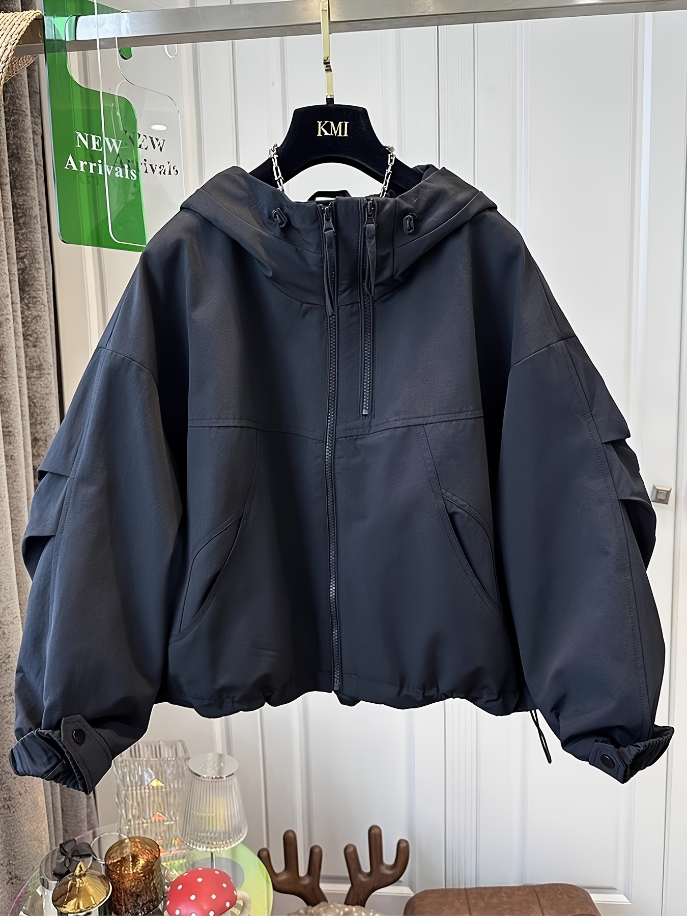 hooded jacket with zipper pockets sold on Temu United States