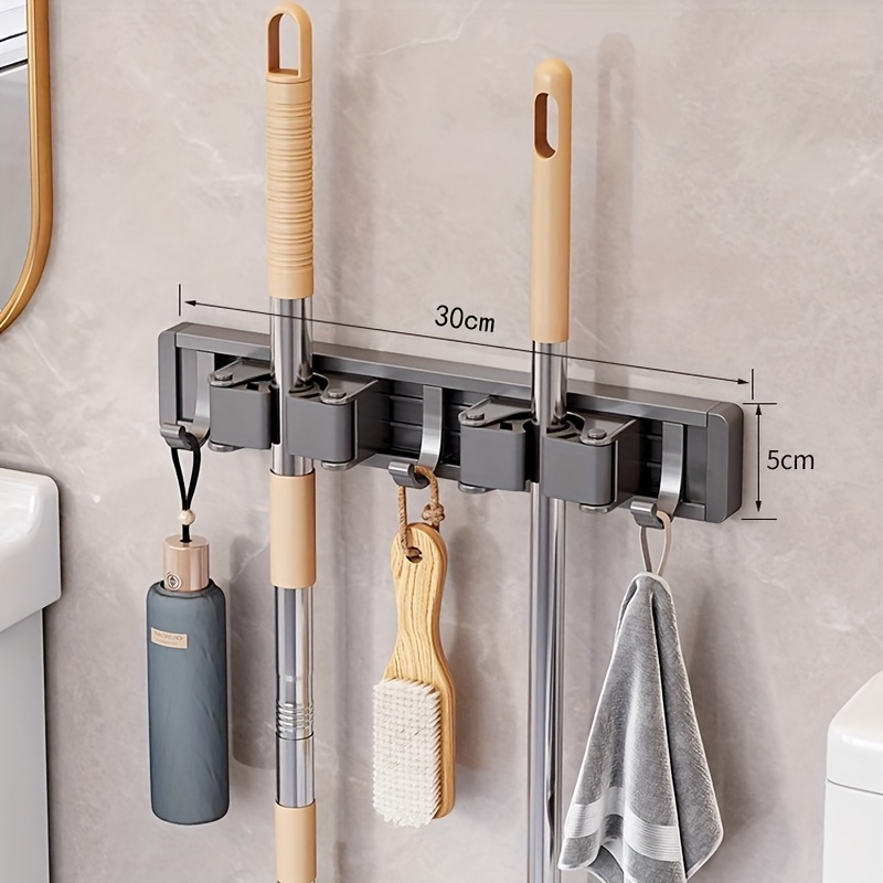Image of Heavy-duty Golden Metal Mop And Broom Holder With Adjustable Hooks - Wall-mounted Organizer For Home, Kitchen, Garden, Laundry Room, Garage - Durable Tool And Equipment Storage Solution, Rack