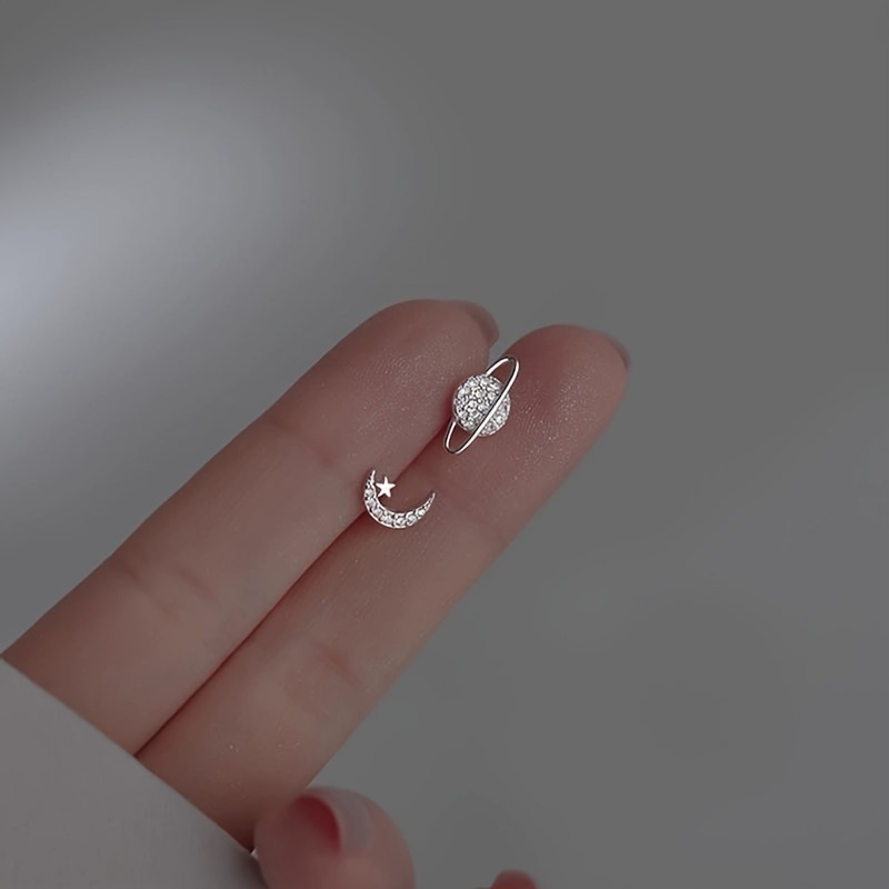 A Pair Of Star And Easy Planet Asymmetrical Earrings For Women