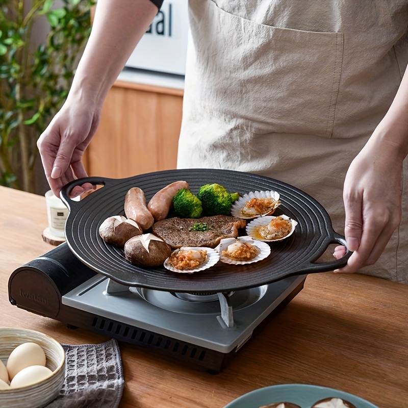 1 heavy duty non stick cast iron grill pan with   korean bbq style oval outdoor cooking plate with handles   for   heating ideal for home kitchen camping 2