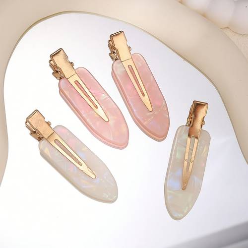 4pcs set pink and white acrylic hair clips with shell glow elegant and minimalist oval shaped hair accessories