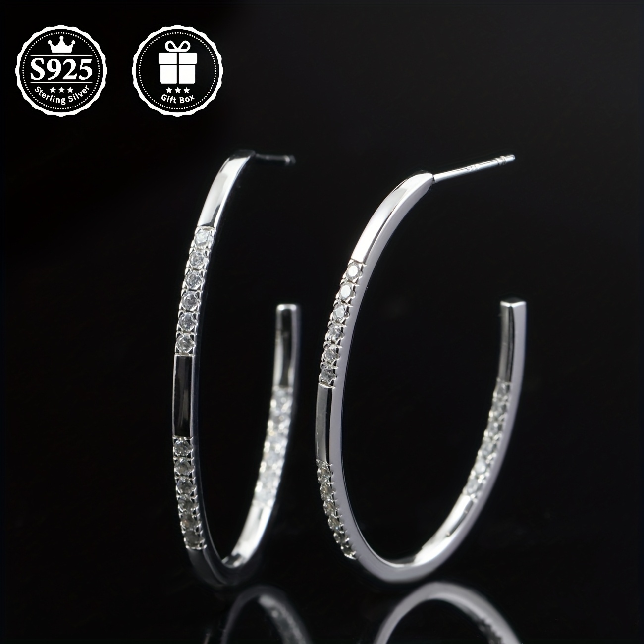 a pair of stud earrings with moissanite moissanite inlaid  925 silver material   are fashionable and elegant stud earrings for ladies which     daily or   as a   present for family   friends or lovers Product details 3