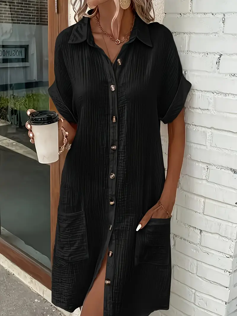 a minimalist white shirt dress made of breathable featuring a sharp collar design and buttons that add a touch of details 19