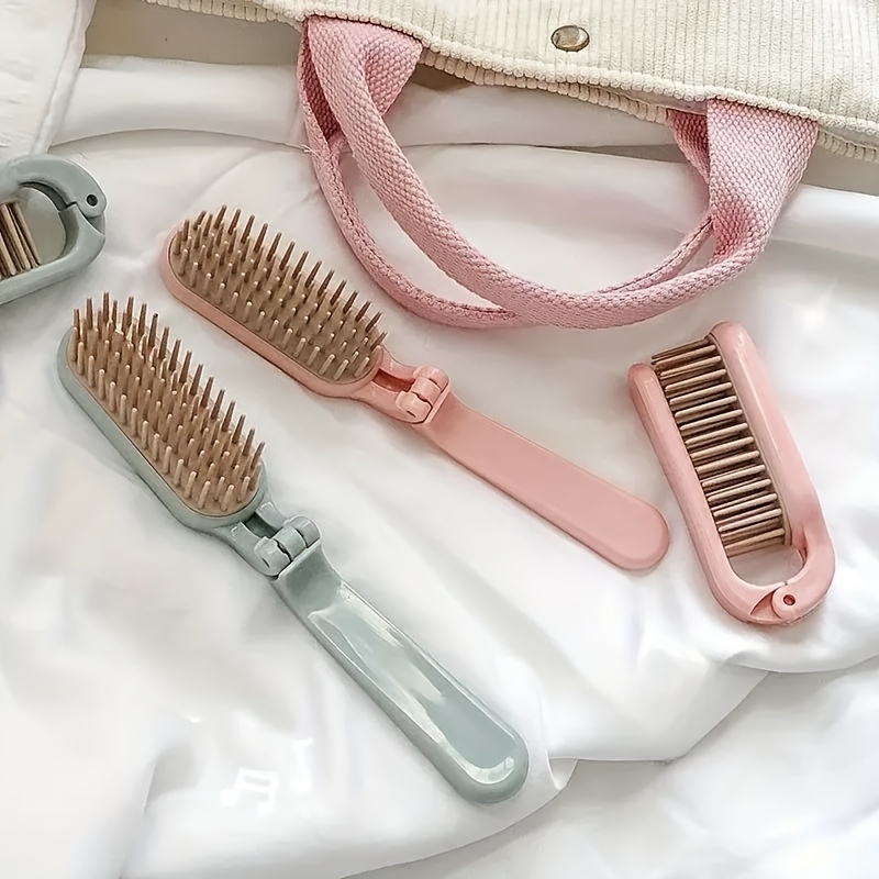 compact folding hair brush portable anti static floor mat comb pink and gray options suitable for all hair types travel friendly detangling and massage brush tool cute hairbrush anti static comb mini hair brush details 0