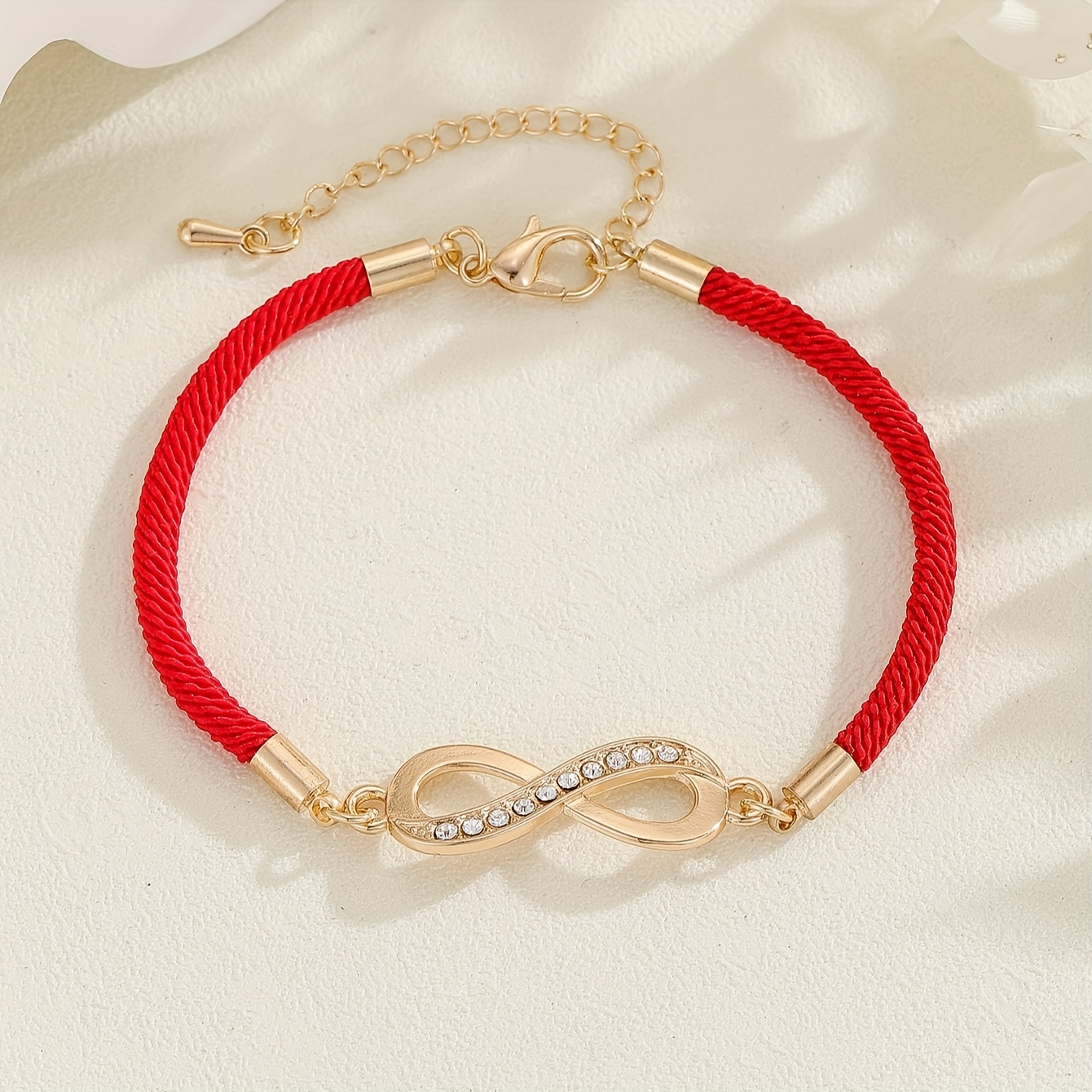 adjustable chinese style festive bracelet with a red rope and   characters suitable for wearing during   festival