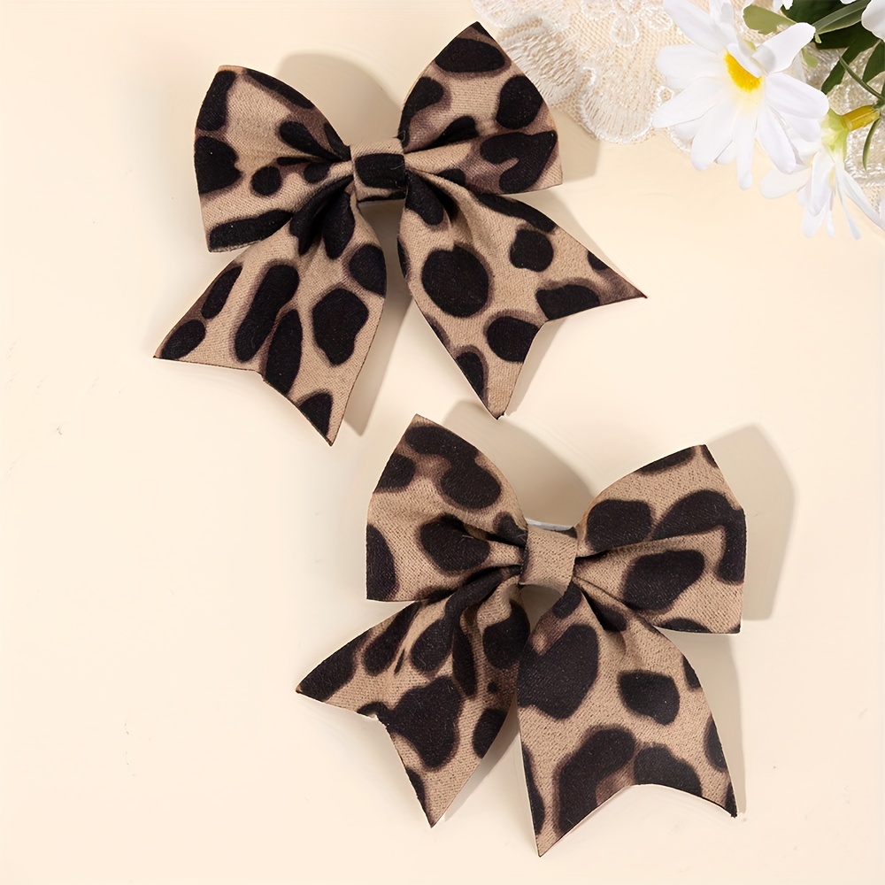 E-shop 2er-Pack Süße Leopard Schleife Haarspangen Elegante Leopard Print Haarnadeln mit Schwanz Premium Haarverzierungen für den täglichen Gebrauch