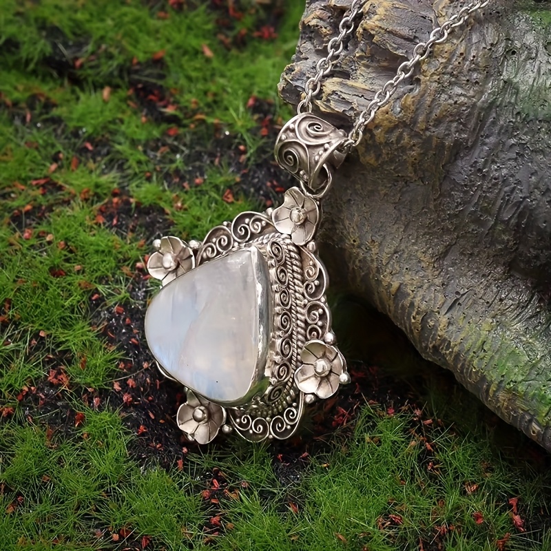 a vintage elegant bohemian teardrop shaped heart floral