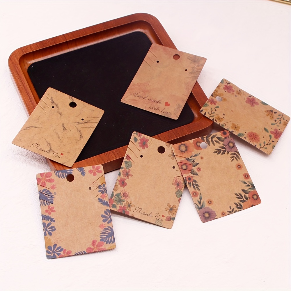 

50pcs Kraft Paper Jewelry Display Cards, 4.83x6.6cm/1.9x2.6inches, Necklace Earring Pouch Cards, Handmade Bracelet Packaging, Rustic Floral Design For Jewelry Presentation
