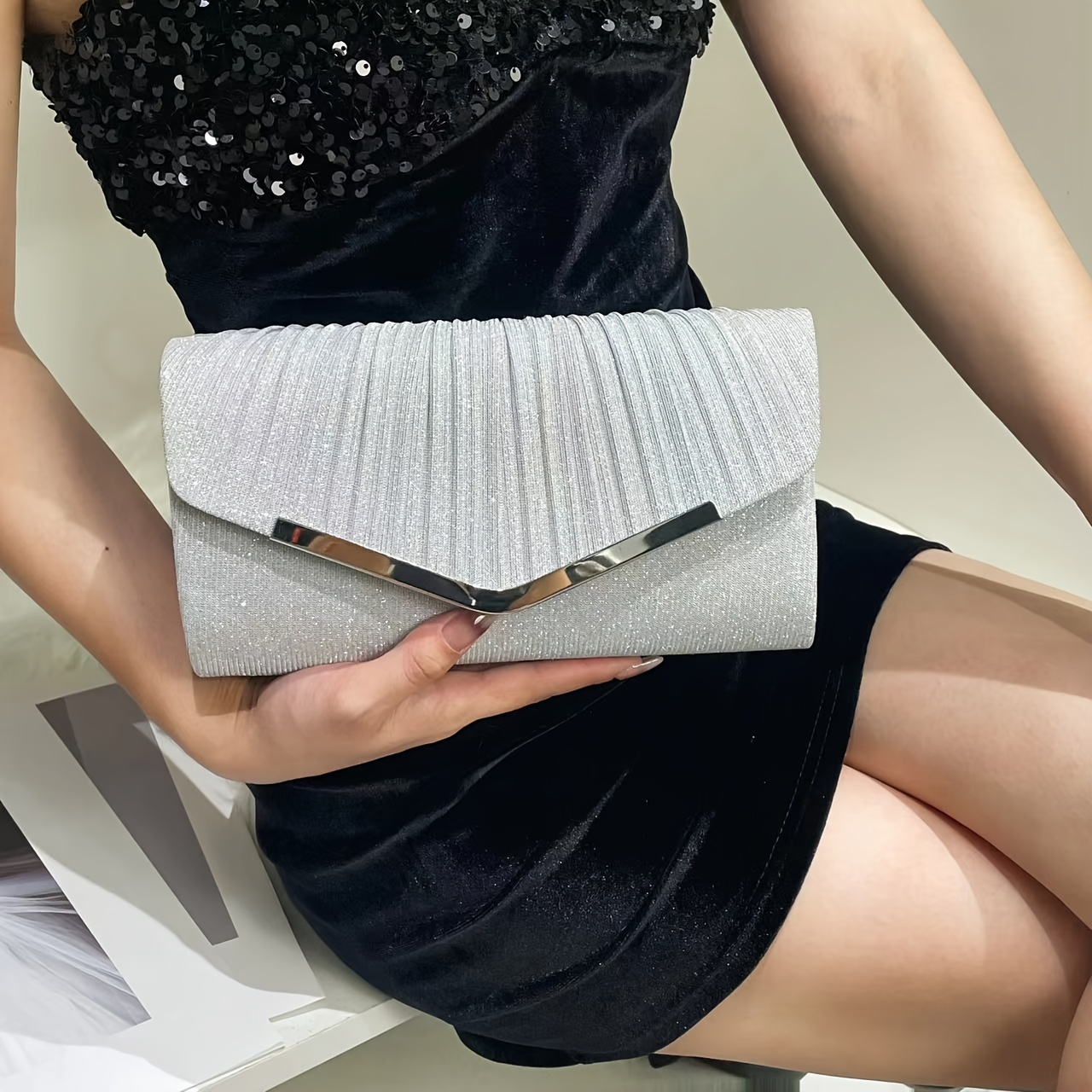 

A Shimmering Envelope Clutch With Golden Decorations, Elegant Ladies At Weddings And Parties.