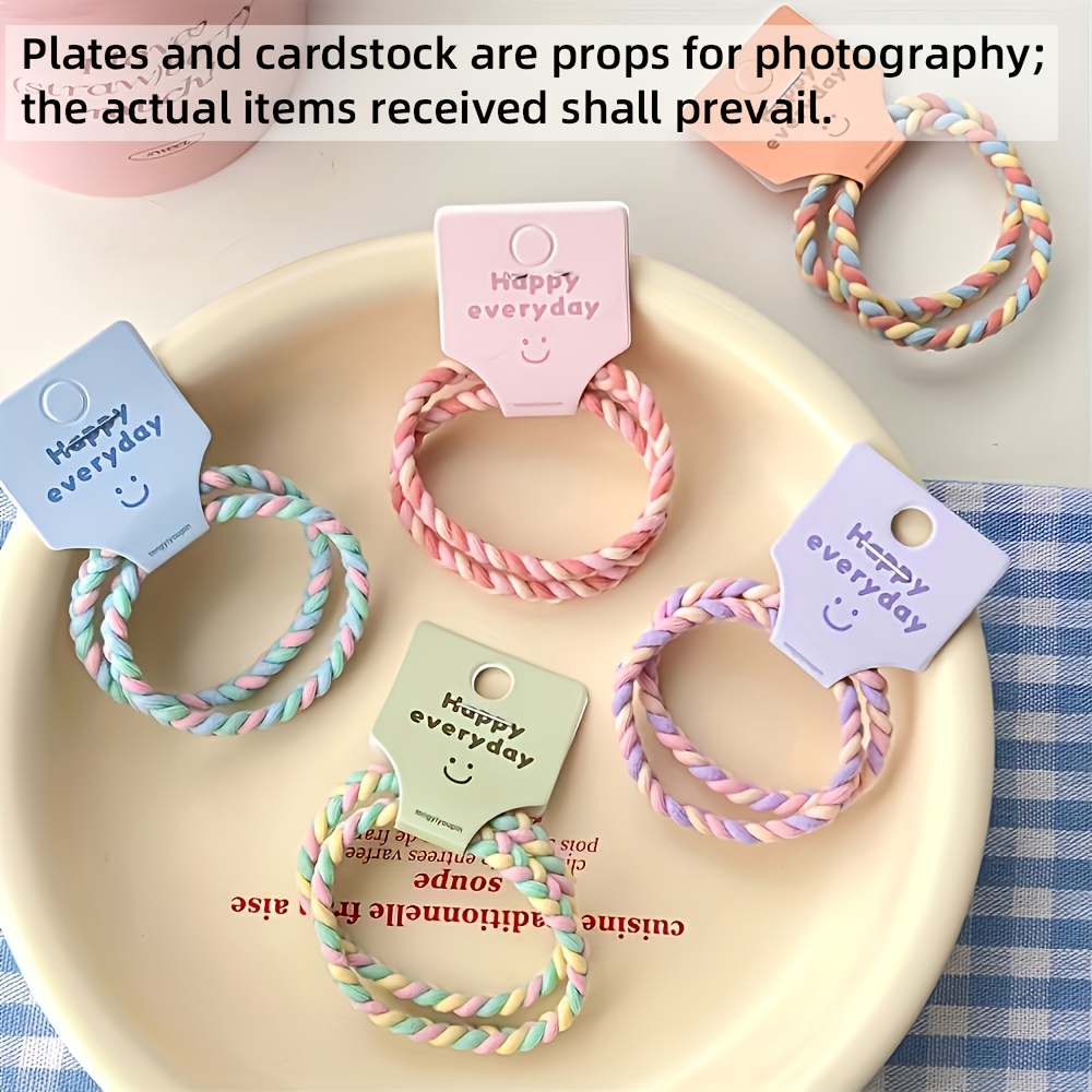 Image of 10 Soft Rainbow Hair Ties | Non-slip Hairbands With Happy Face Tags In Soft Pink, Mint Green, Lavender, Peach, Beige, Sky Blue, White, Pink, And Yellow - Birthday Party Set