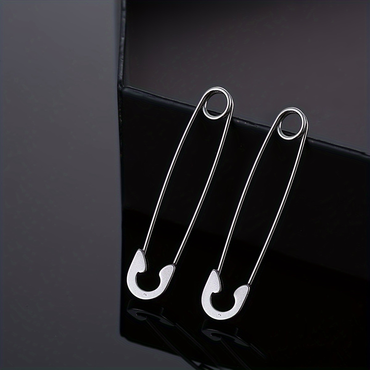 A Pair Of Trendy And Easy Stainless Steel Pin Earrings Designed For Men, Appropriate For Genders In Hip-, Ideal For Everyday Wear Or Parties, And